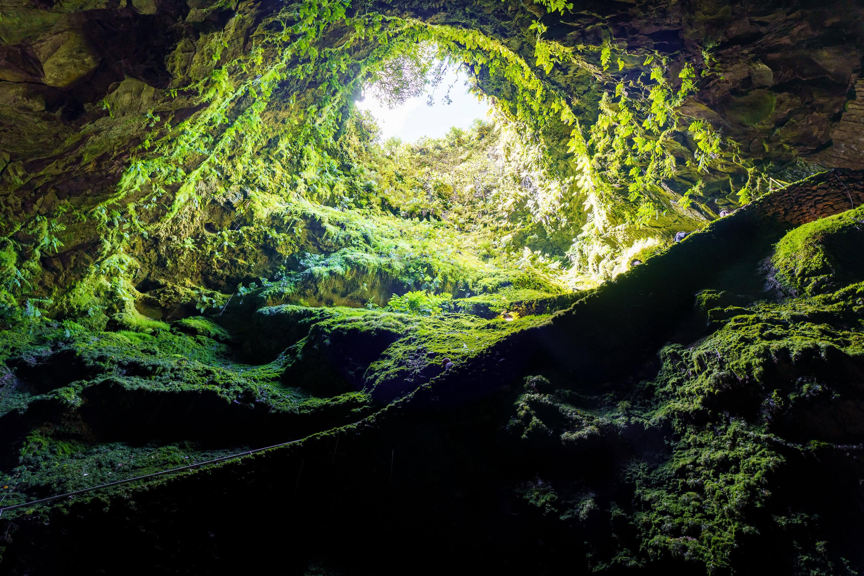 Volcanic formations inside Algar do Carvao on Terceira Island