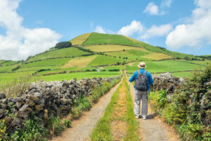 A man Hiking in Faial Island in the Azores