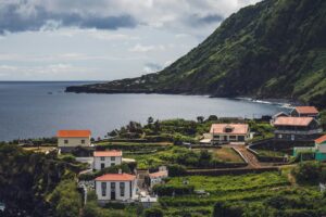 Village on the ocean beach located on geology construction named fajã on São Jorge, Azores